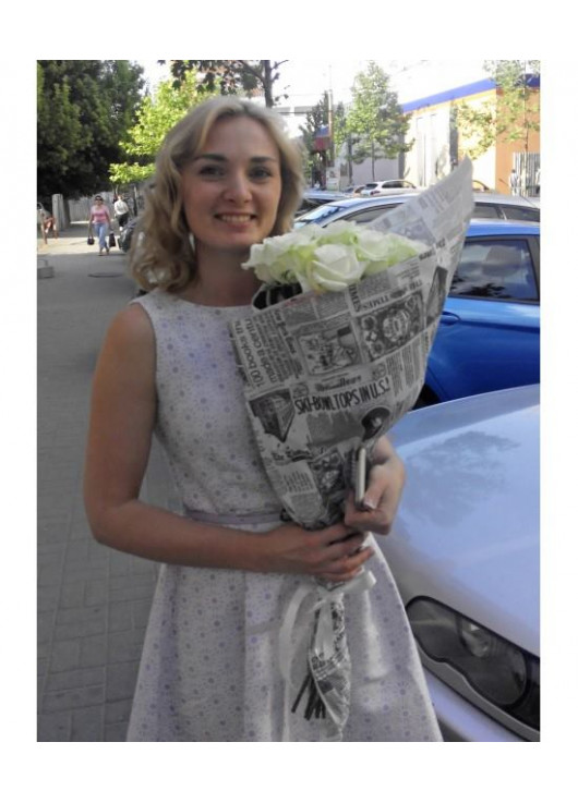 Розы в газетной бумаге