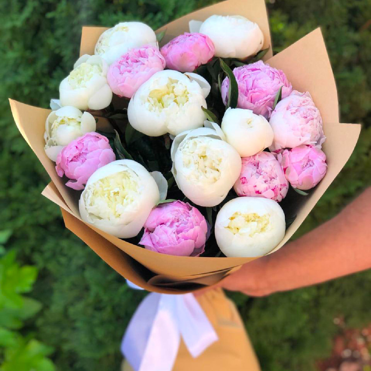 beautiful bouquet of white and pink peonies